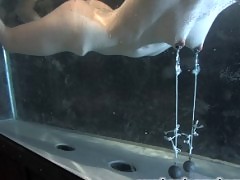 Hard bondage and water torture on a sexy young brunette